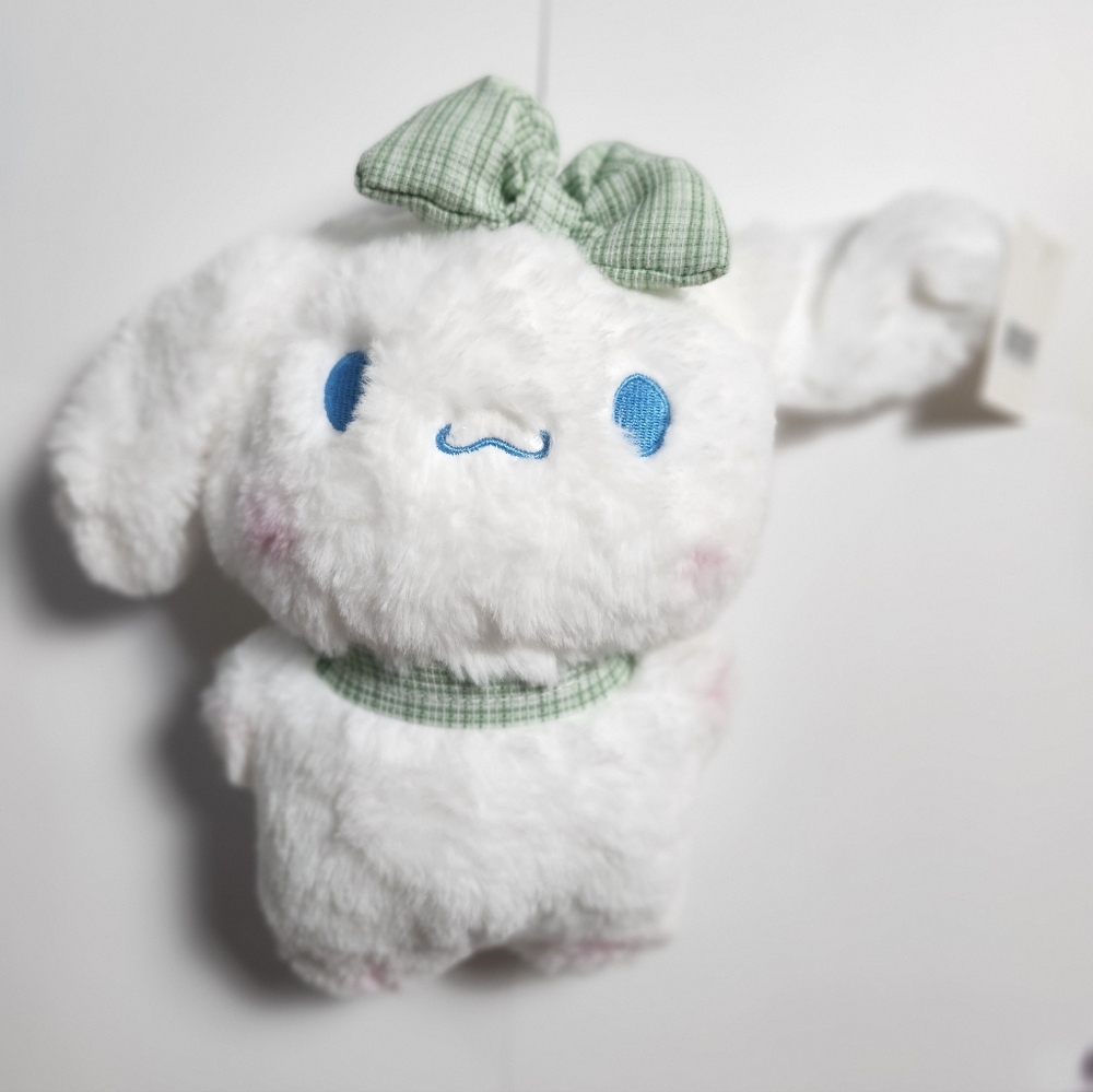 Cute White Plush Toy with Green Bow